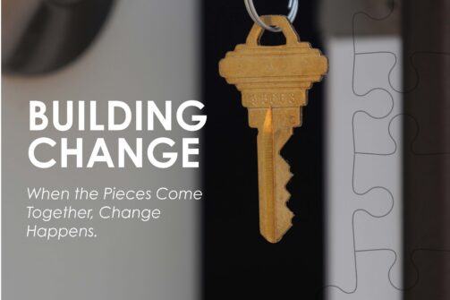 A close-up of a house key in a door lock, with text promoting change and an annual report for lacasa. Puzzle piece outlines are visible in the background.